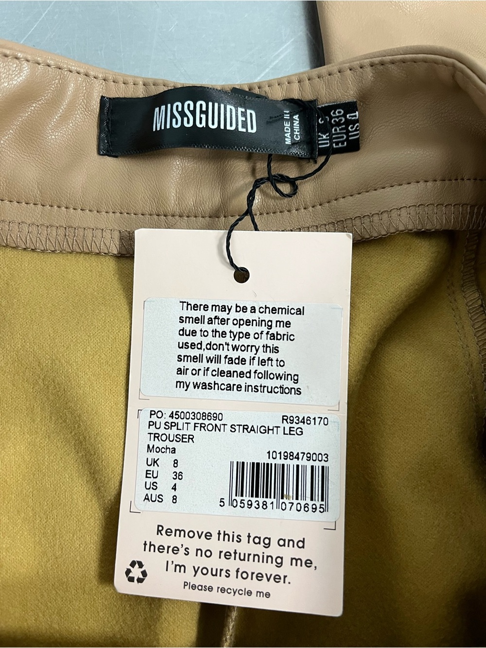 Tan misguided trousers feature a distinctive split front straight leg design